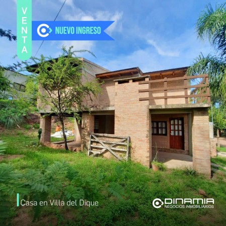 SE VENDE CASA DE DOS PISOS EN VILLA DEL DIQUE.